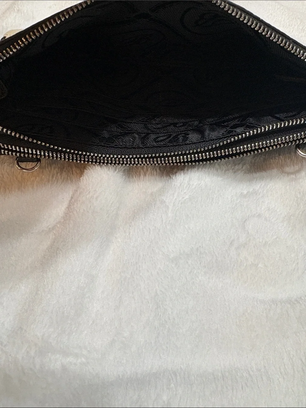 Brighton Cream Leather Zip Clutch with Black Medallion